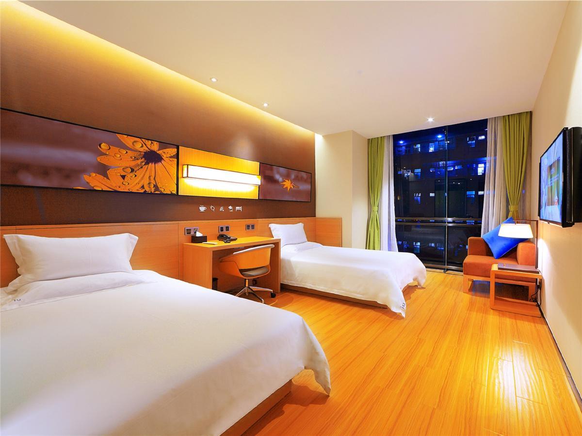 Iu Hotel Zhanjiang Haibin Avenue Xinhaimingchen ภายนอก รูปภาพ